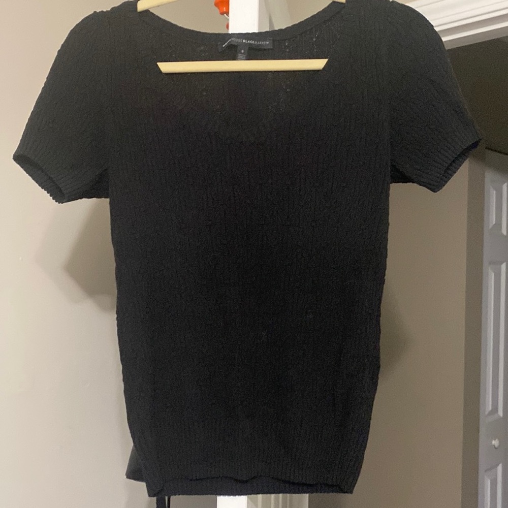 Black sweetheart/V neckline sweater. Short sleeved.